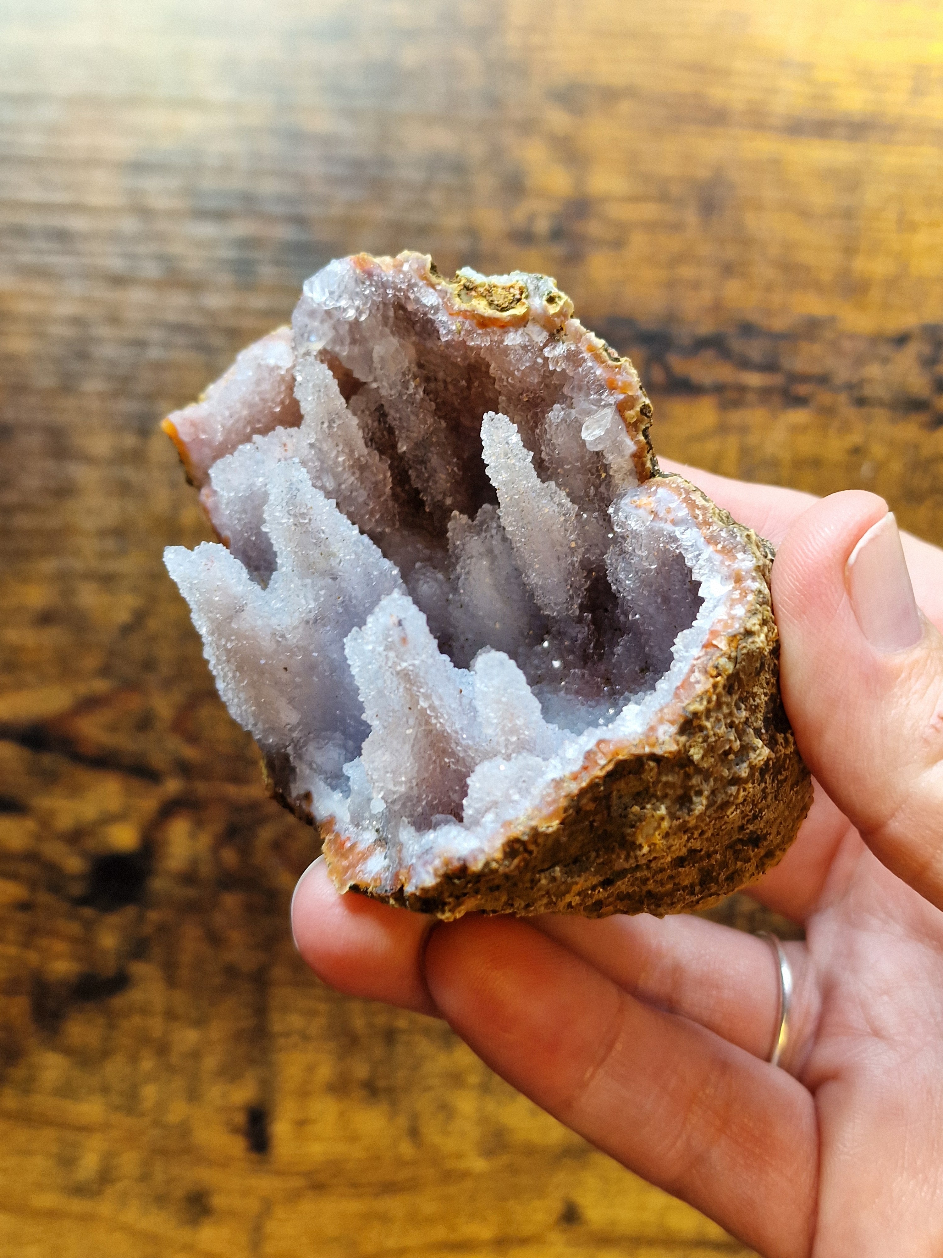 Pink Chalcedony Stalactite Formation in Display Case