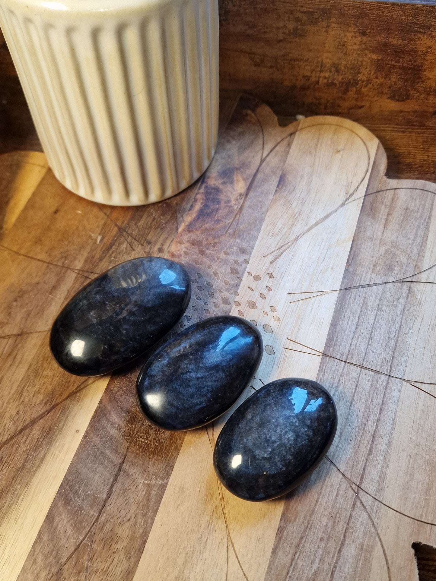 Silver sheen obsidian palm stones