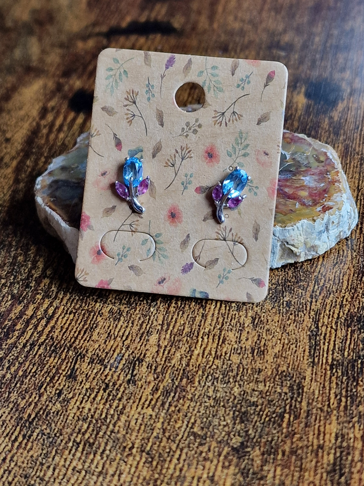 Blue Topaz & Ruby leaf studs