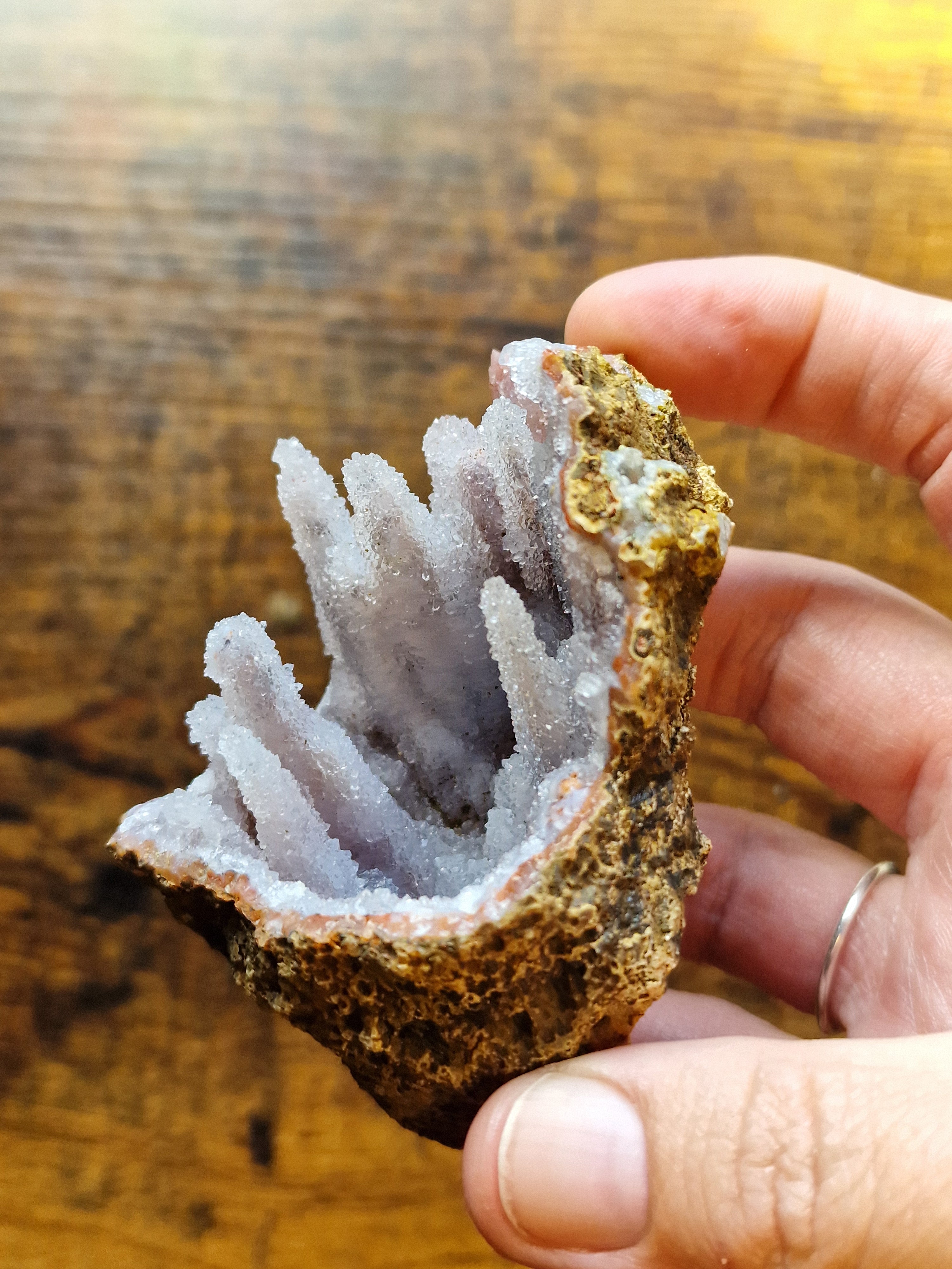 Pink Chalcedony Stalactite Formation in Display Case
