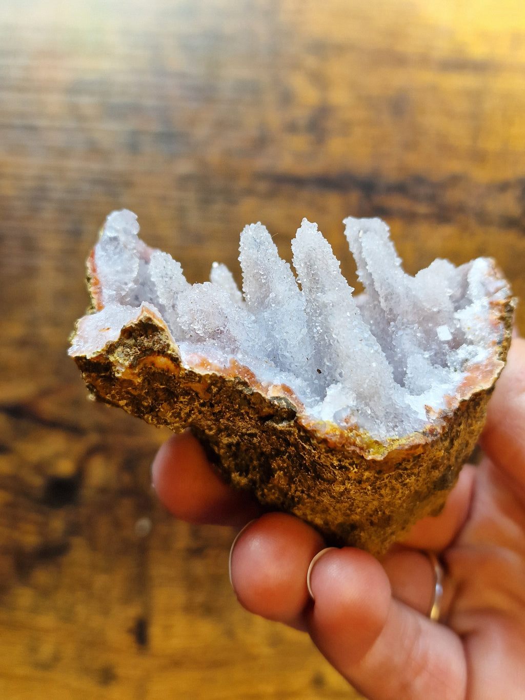 Pink Chalcedony Stalactite Formation in Display Case